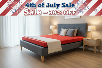 Bedroom with gray bed frame and red mattress cover, 4th of July sale text overlay.